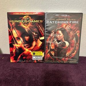 Lot of 2 Hunger games DVDs New the first one and catching fire action drama